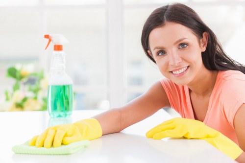 Carpet cleaning team applying health and safety controls before work begins