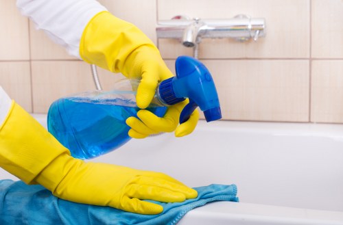 Carpet cleaner managing workplace safety during active cleaning operations